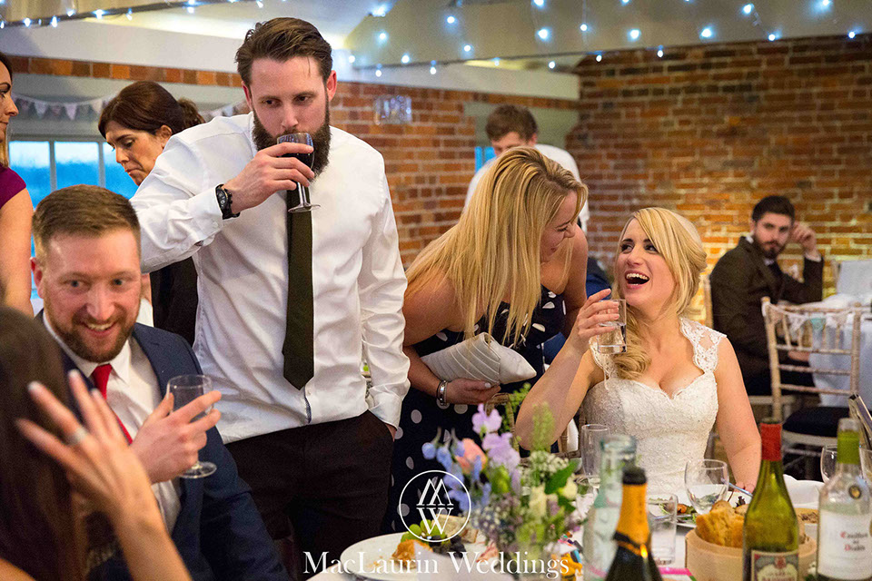 bride and her guests having drinks and a laugh