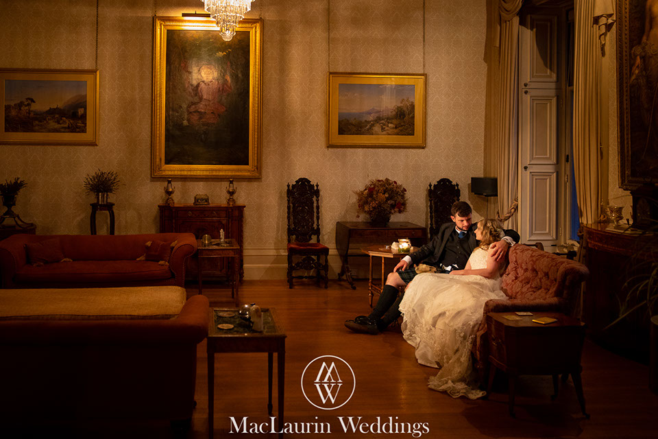 hairstylist styling hair before the wedding 