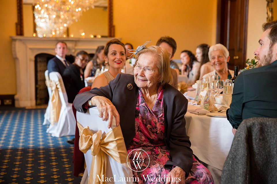 guests listening to the speeches at a wedding&nbsp; reception in dalhousie castle scotland