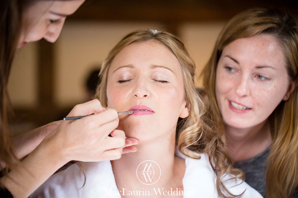 Applying make-up before a wedding