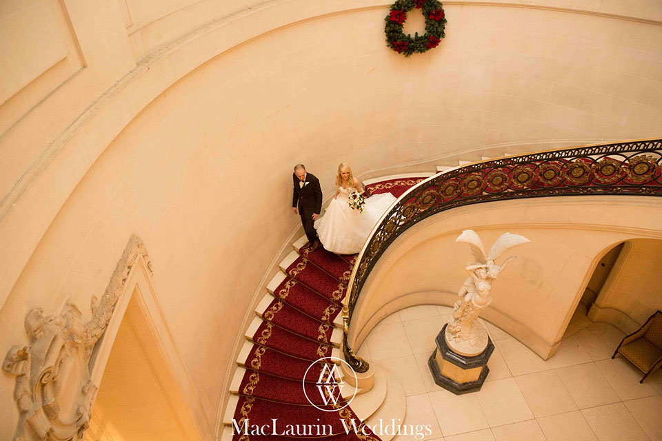 bride and her father on the stairs