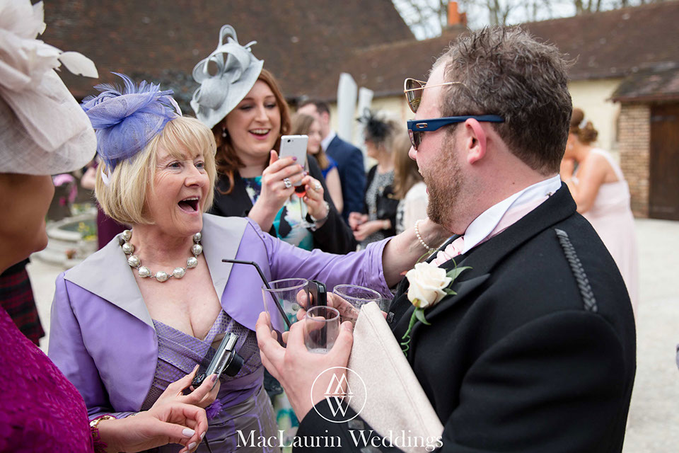 wedding guests having a fun wedding moment 