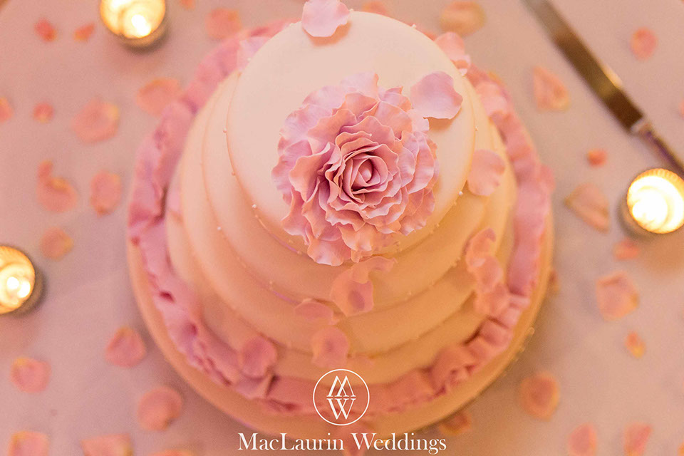 a top view of a pink wedding cake 